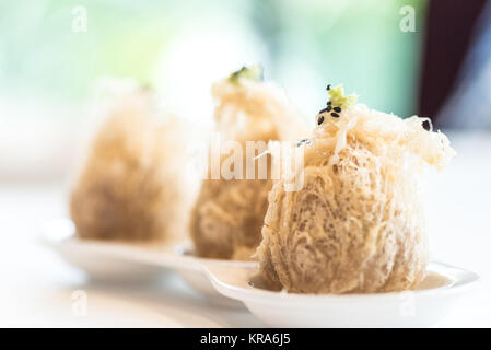 Fritti gnocchi di taro. Foto Stock