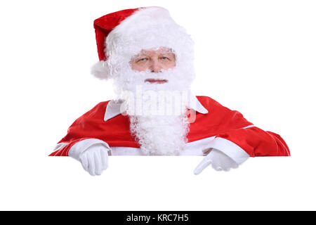 Nikolaus Weihnachtsmann Weihnachten zeigen leeres Schild mit Textfreiraum für Ihren eigenen Text Foto Stock