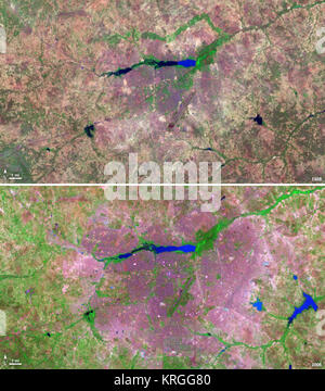 I paesi senza sbocco sul mare western nazione africana del Burkina Faso ha conosciuto un 200% di aumento della popolazione urbana tra 1975 e 2000. Come risultato, l'area della città capitale Ouagadougou è cresciuto di 14 volte durante questo periodo. Queste immagini Landsat mostrano l'espansione della città verso l'esterno dal suo centro nei due decenni tra il 1986 e il 2006. Il 9 novembre 18, 1986 Il satellite Landsat 5 satelliti acquisito questa immagine della capitale. Questa falsa immagine a colori mostra la vegetazione in shads di verde e grigio, acqua in varie tonalità di blu, e le aree urbane in rosa e viola. La pista di l'aeroporto della città può essere visto come una lunga Foto Stock