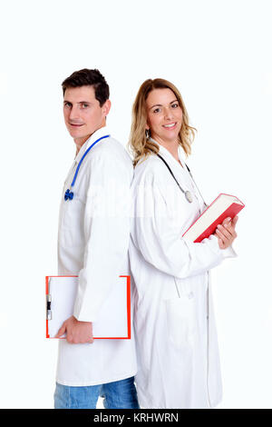 Giovane, Gentile team di medici con libro in camice Foto Stock