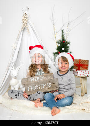 Fratello e Sorella di santa hat Foto Stock