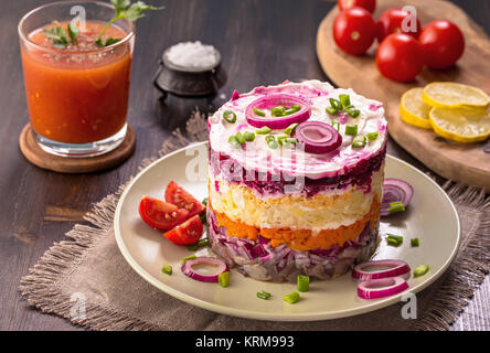 Vestito aringa con succo Foto Stock