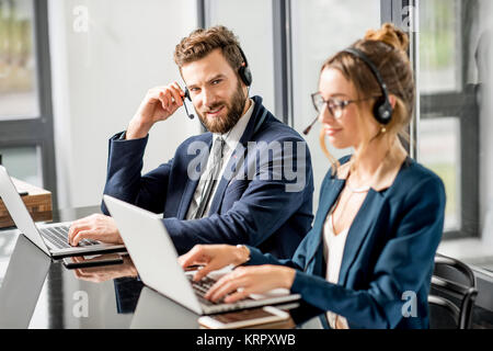 Conferenze di affari con cuffia Foto Stock