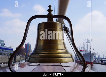 old ship's bell on a sailing ship Stock Photo