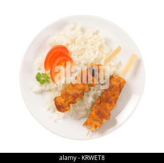 Pollo speziato souvlaki con riso Foto Stock