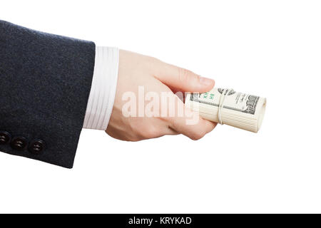 Business man mano che tiene arrotolato in carta moneta dollaro Foto Stock