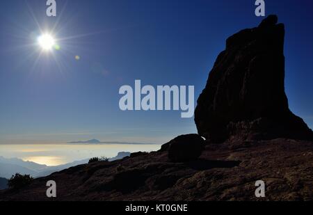 Intenso il tramonto e la roccia della rana, vertice di Gran Canaria Isole Canarie Foto Stock