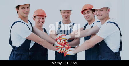 Team di costruttori di unire le vostre mani in cerchio Foto Stock