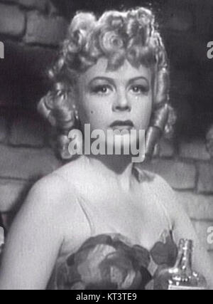 Iris Adrian era una figura rinomata nel burlesque, nota per le sue esibizioni negli anni '1940 Il titolo si riferisce a un'immagine di lei, probabilmente ritagliata per la messa a fuoco artistica, mostrandola come un'icona della scena burlesque di quell'epoca. Foto Stock