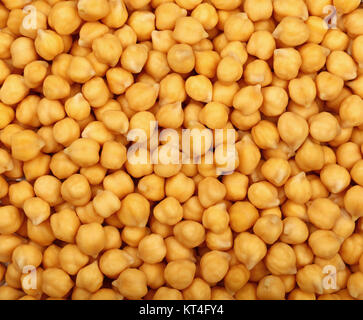 Cucinato imbevuto di ceci fagioli close up sullo sfondo Foto Stock