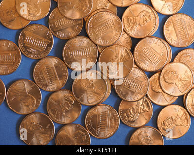 Un centesimo di dollaro monete, Stati Uniti su blu Foto Stock