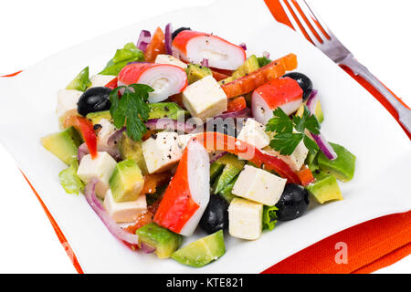 Insalata di verdure con avocado, surimi e feto. Foto Studio Foto Stock