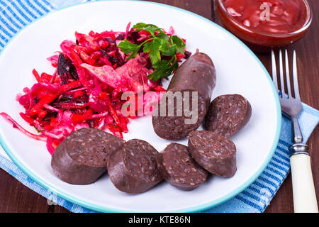 Black Pudding, sangue salsiccia tagliata a pezzetti. Foto Studio Foto Stock