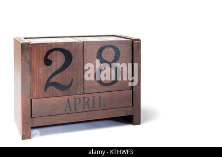 Legno calendario perpetuo impostato al 28 aprile Foto Stock