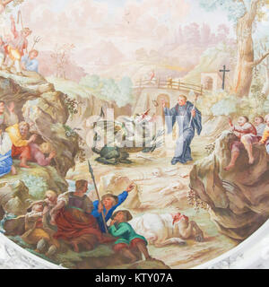 Affresco di San Magnus o Mang, espellendo un drago dal paese di cui aveva bisogno per il monastero di Fussen in Baviera, Germania. Foto Stock