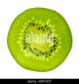 Macro vista dall'alto di un'actinidia kiwi slice, retroilluminazione Foto Stock