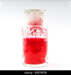 Contenitori di vetro naturale contenente pigmenti colorati in polvere Foto Stock
