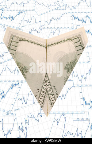 Dollar aeroplano di carta, la concezione di business. Sul business del diagramma Foto Stock