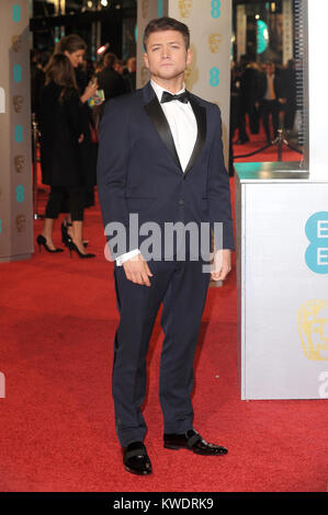 Taron Egerton assiste l'EE British Academy Film Awards 2016 presso la Royal Opera House di Londra. 14 febbraio 2015 © Paul Treadway Foto Stock