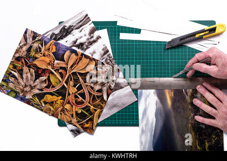 Uomo fotografie di trimming sul verde tappeto di taglio con un bisturi. Foto Stock