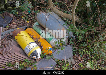 Abbandonate le bombole di gas Foto Stock