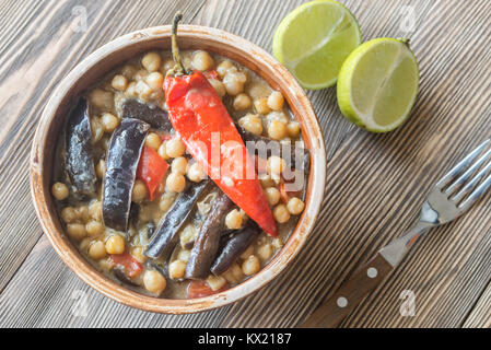 Melanzane e curry di ceci Foto Stock