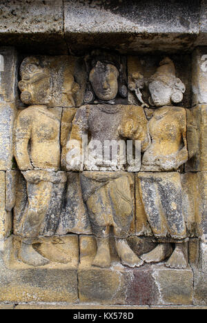 Le donne sulla parete di Borobudur, Java, Indonedsia Foto Stock