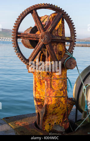 Denti arrugginiti su dockyard verricello, Valentia Island, nella contea di Kerry Irlanda Foto Stock