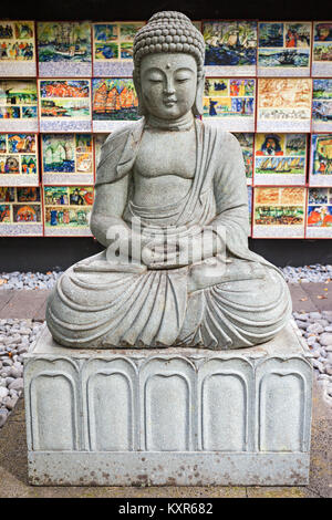 FUNCHAL, MADEIRA - Luglio 04, 2014: Statua di Buddha nel Monte Palace Tropican Giardino a Funchal, Madeira, Portogallo. Foto Stock