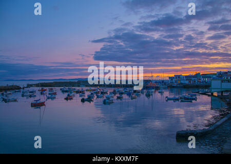 Portrush Harbour al crepuscolo Foto Stock