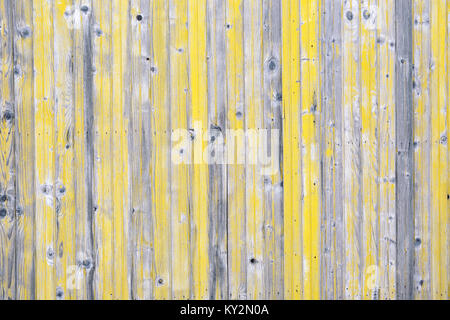 In legno antico con sfondo grigio e vernice gialla Foto Stock