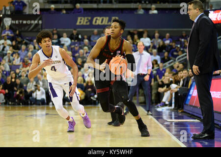 Seattle, WA, Stati Uniti d'America. Xiii gen, 2018. Stanford di Okpala Kezie (0) in azione contro Washington Thybulle Matisse (4) durante una PAC12 gioco di basket tra il Washington Huskies e Stanford cardinale. Il gioco è stato giocato al Hec ed Pavilion a Seattle, WA. Jeff Halstead/CSM/Alamy Live News Foto Stock