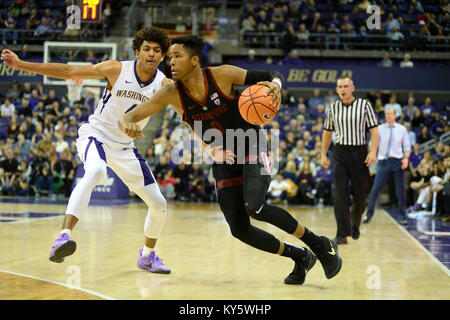 Seattle, WA, Stati Uniti d'America. Xiii gen, 2018. Stanford di Okpala Kezie (0) in azione contro Washington Thybulle Matisse (4) durante una PAC12 gioco di basket tra il Washington Huskies e Stanford cardinale. Il gioco è stato giocato al Hec ed Pavilion a Seattle, WA. Jeff Halstead/CSM/Alamy Live News Foto Stock