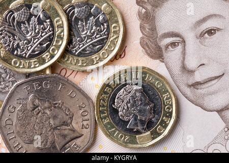 Valuta britannica, monete e banconote Foto Stock