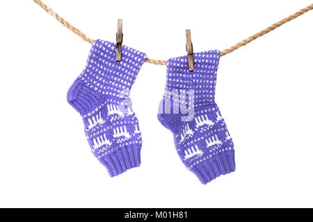 Bellissima Calze a maglia con un ornamento appeso a una fune Foto Stock