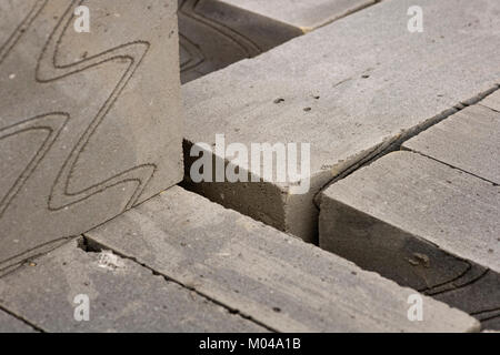 Pila di leggero edificio termale blocchi semi sfondo astratto Foto Stock