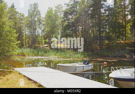 Serena Lakeside Scene, Ljustero, contea di Stoccolma, Svezia, in Scandinavia. Foto Stock