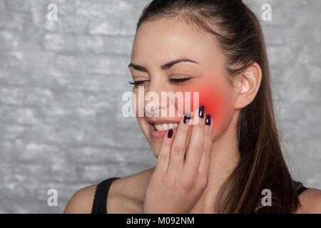 Mal di denti radiali, si diffonde su tutta la ganascia Foto Stock