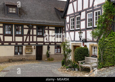 Metà medievale-case con travi di legno nella città di Herrstein, Hunsrueck, in Germania, in Renania Palatinato Foto Stock
