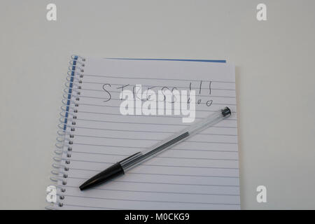 Stress Handwriten su blocco note Foto Stock