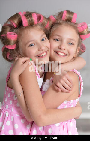 Carino gemelle Foto Stock