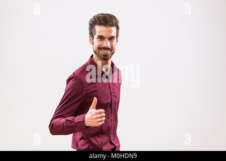 Studio shot Ritratto di giovane imprenditore di successo. Foto Stock