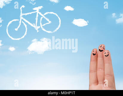 Felice allegro smiley dita guardando una bicicletta shapeed cloud Foto Stock