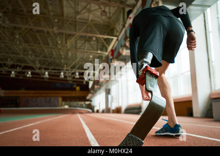 Disabilitato Runner su Start vista posteriore Foto Stock