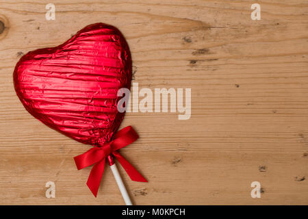 A forma di cuore per lecca-lecca candy il giorno di san valentino regalo. Foto Stock