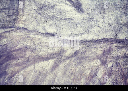 Vecchio incrinato un muro di cemento o di sfondo texture. Foto Stock