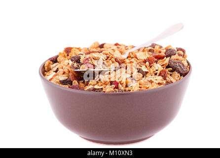 Muesli nel recipiente isolato su sfondo bianco. Foto Stock