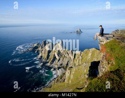 Norvegia, Nordland County, a nord del Circolo Polare Artico, Vesteralen arcipelago tra le isole Lofoten e di Tromso, Andoya isola (Andoy), trekker in occasione del vertice di Matind (408m) Foto Stock