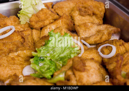 Pezzi di pesce bianco, fritte nel pangrattato Foto Stock