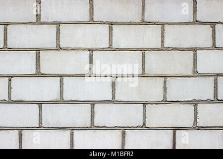 Parete di marmo a trama dettaglio sullo sfondo di una pietra nella città, facciata decorata. Foto Stock